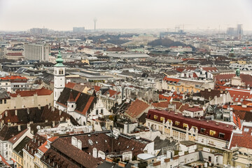 Obraz premium A city Vienna Austria view with a green dome on top of a building