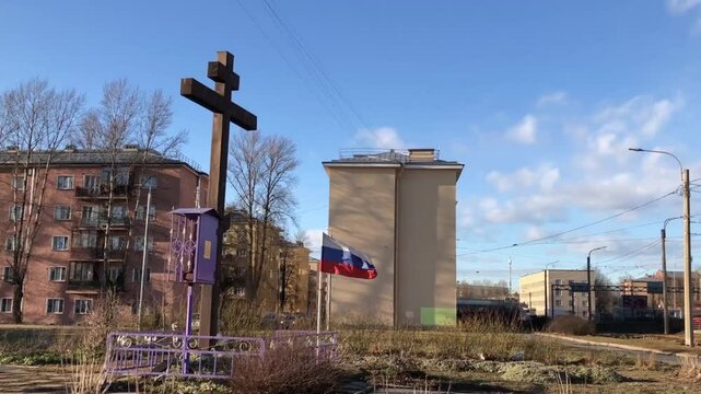 huge wooden cross on grave