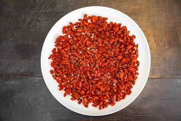 The goji berry, also known as wolfberry pinyin, is the sweet fruit of Lycium barbarum or Lycium...