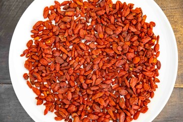 The goji berry, also known as wolfberry pinyin, is the sweet fruit of Lycium barbarum or Lycium...