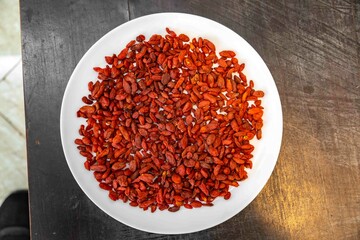 The goji berry, also known as wolfberry pinyin, is the sweet fruit of Lycium barbarum or Lycium chinense, two closely related species of thornbush in the nightshade family, Solanaceae.