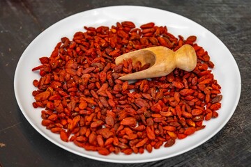 The goji berry, also known as wolfberry pinyin, is the sweet fruit of Lycium barbarum or Lycium chinense, two closely related species of thornbush in the nightshade family, Solanaceae.