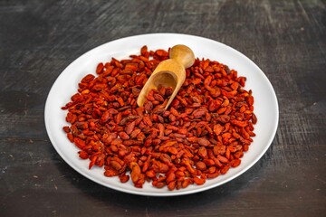 The goji berry, also known as wolfberry pinyin, is the sweet fruit of Lycium barbarum or Lycium...