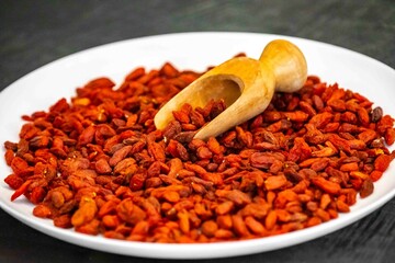 The goji berry, also known as wolfberry pinyin, is the sweet fruit of Lycium barbarum or Lycium chinense, two closely related species of thornbush in the nightshade family, Solanaceae.