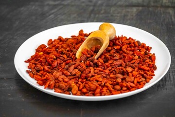 The goji berry, also known as wolfberry pinyin, is the sweet fruit of Lycium barbarum or Lycium chinense, two closely related species of thornbush in the nightshade family, Solanaceae.