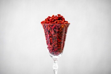 The goji berry, also known as wolfberry pinyin, is the sweet fruit of Lycium barbarum or Lycium chinense, two closely related species of thornbush in the nightshade family, Solanaceae.