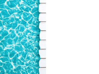 Clear turquoise water flowing beside a white pool deck on a transparent background, cut out