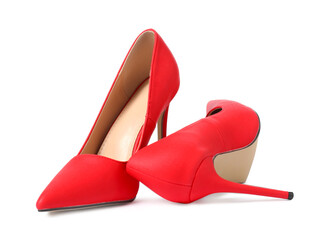 Beautiful red high heeled shoes isolated on white