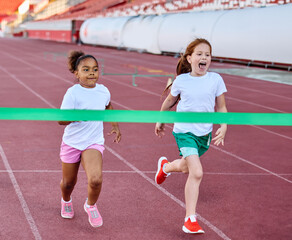 child sport athlete competition running race exercise sprinting speed runner achievement finish...