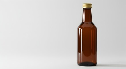 Elegant brown glass bottle with golden cap on a clean background