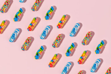 Medical pill capsules filled with colorful sugar sprinkles, creative concept