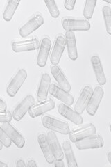 Transparent Empty Gelatin Capsules Background, Pharmaceutical Concept