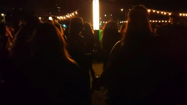 Slow motion video of women dancing candombe music at concert in the historic ciudad vieja neighborhood of montevideo, uruguay
