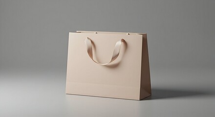 Elegant Pink Shopping Bag with Ribbon Handles on Gray Background