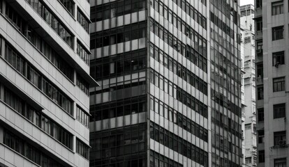 Obraz premium Monochrome buildings in the city with a geometric facade,