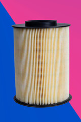 Air filter made of paper. The filter element is used in a car. Close-up.