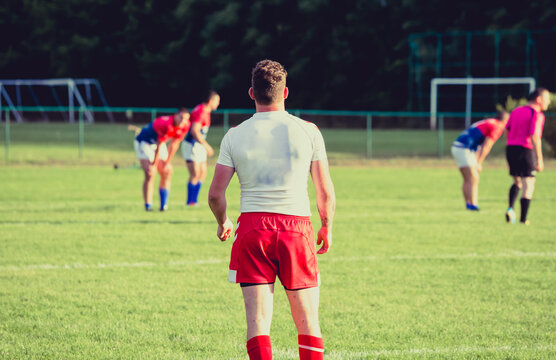 Rugby player from behind. Game, match