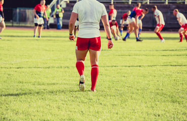 Rugby sportsman player walking on the field