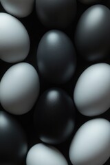 Colorful easter eggs in shades of black and white create a striking contrast, arranged for an artistic display that captures the essence of spring festivities and joyful celebrations Generative AI