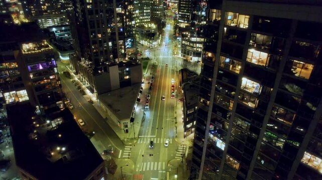 Night Aerial of Apartment Building Overlooking City Street