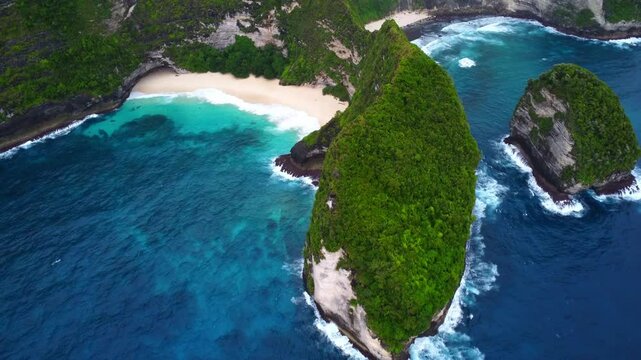 Aerial drone view of Nusa Penida Kelingking Beach, Bali. View of the cliff and turquoise water. Indonesia