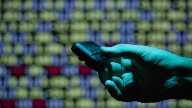 Pager beeper device close up on a desk, retro phone 90s instant communication and connection, sms messaging in the early 80s 90s digital age