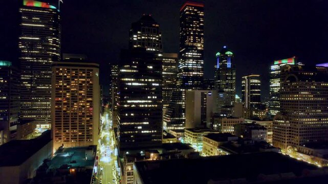 Rising Aerial of Seattle Buildings at Night in Holiday Season