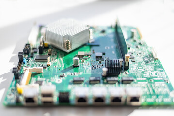 Computer motherboard, close up shot of green computer motherboard. Electronic parts and system...