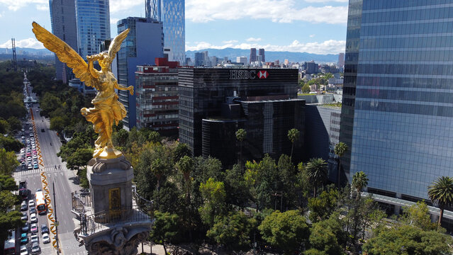 Mexico City, Mexico - October 26, 2021: HSBC building aerial view, Europe's largest bank by market value, in Paseo de la Reforma avenue. Angel of Independence monument is seen on the left.