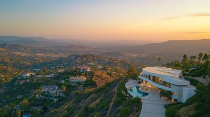Obraz premium Modern Hilltop Mansion Sunset View Overlooking Cityscape