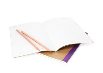 Copybooks and pencils isolated on white. School stationery