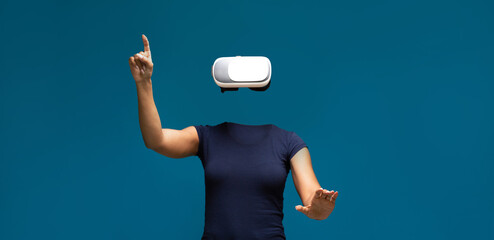 A user is experiencing virtual reality with a headset, engaging in an interactive activity. The...