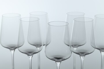 Clean glasses on light grey background, closeup