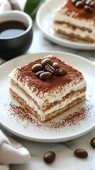 Delicious tiramisu dessert with coffee beans presented elegantly on a plate