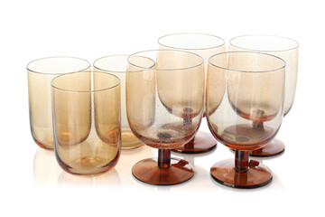 Many empty clean glasses isolated on white
