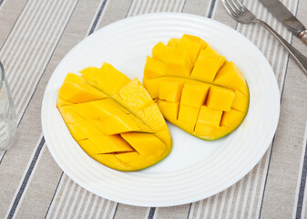 Nice refreshing diced mangoes served on plate with style