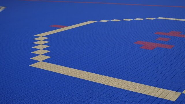 Close panning shot of dek hockey rink during the spring summer time