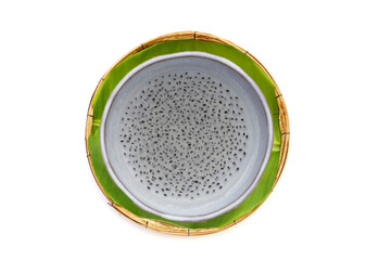 Basil seeds in syrup in bowl on yellow background.