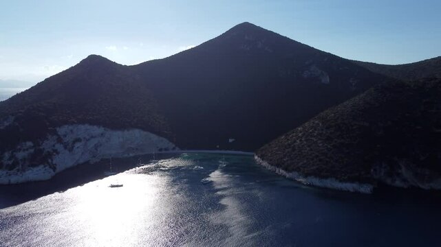 Aerial of the Foki Beach in Fiskardo village on the Ionian island of Kefalonia, Greece at sunset