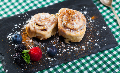 Tasty dessert Cinnabon - Cinnamon Rolls with cream frosting