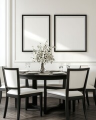 Elegant dining room with round table, white chairs, and two empty frames.