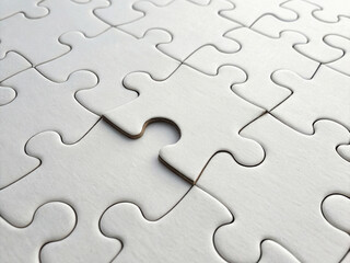 Close-up of Assembled White Jigsaw Puzzle Pieces