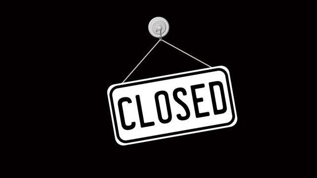 The sign with an inscription swings on a black background.
A sign displays the word closed, signaling that the establishment is not open for business.
