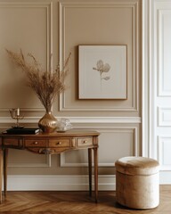 Elegant interior with console table, artwork, and ottoman.