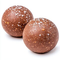 Two Brown Chocolate Truffles Sprinkled with Sea Salt on White Background
