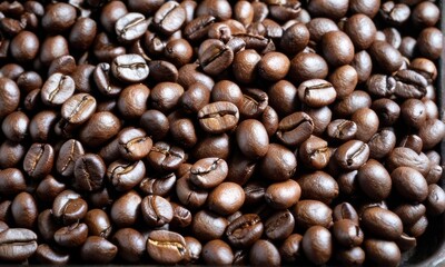 Fototapeta premium Dark Brown Roasted Coffee Beans Close Up Texture