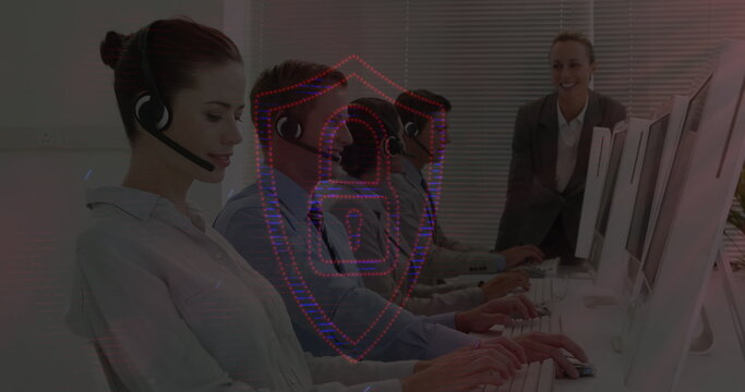 Customer service team using computers with digital security interface overlay