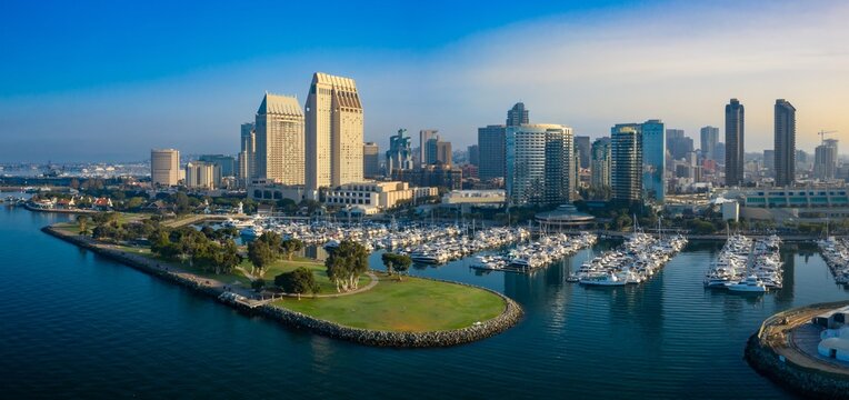 San Diego, California , USA: Aerial view of the city skyline, marina, and harbor and Embarcadero Marina Park North. The image showcases the urban landscape and coastal beauty of San Diego.