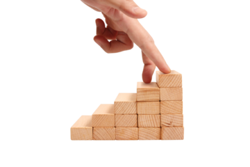 Building success progression of wooden blocks office desk setting abstract concept inspirational mood close-up view