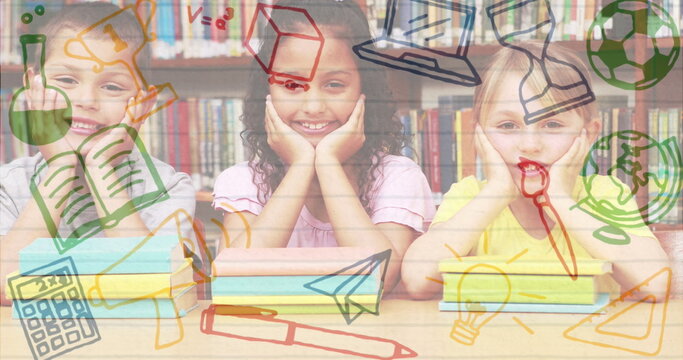 Smiling children in school library surrounded by colorful educational doodles